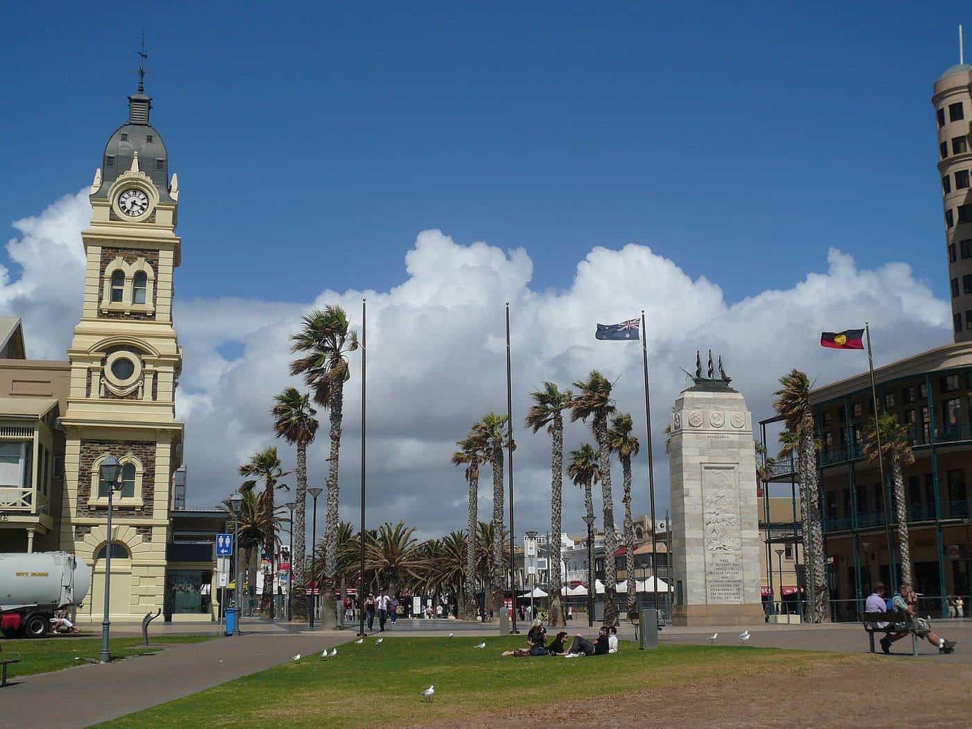Moseley Square at Glenelg with palm trees and a clock tower near the beach